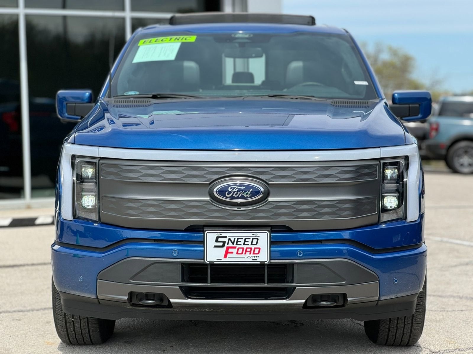 Used 2022 Ford F-150 Lightning Lariat with VIN 1FT6W1EV2NWG10599 for sale in Gower, MO