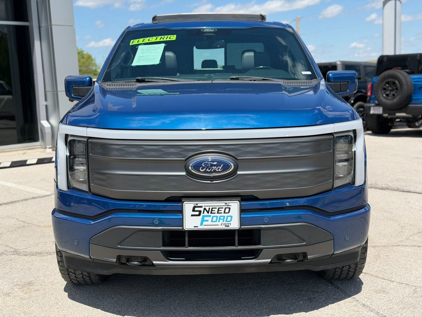 Used 2022 Ford F-150 Lightning Lariat with VIN 1FT6W1EV5NWG04280 for sale in Gower, MO