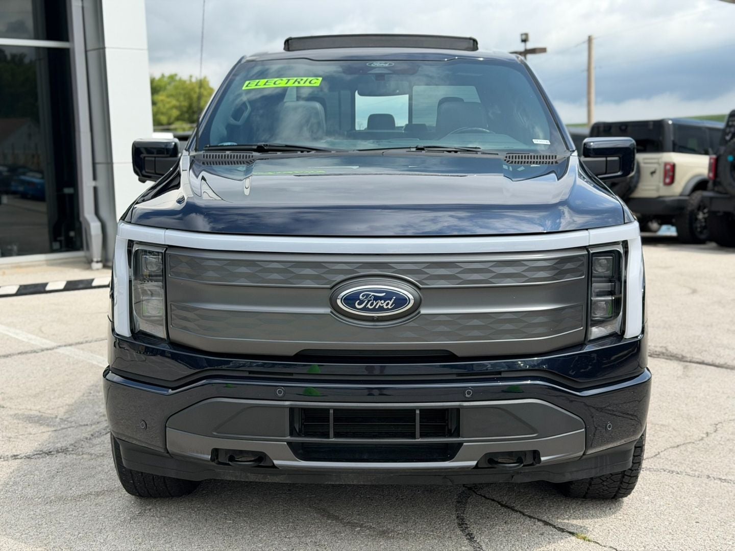 Used 2022 Ford F-150 Lightning Lariat with VIN 1FT6W1EV6NWG10931 for sale in Gower, MO