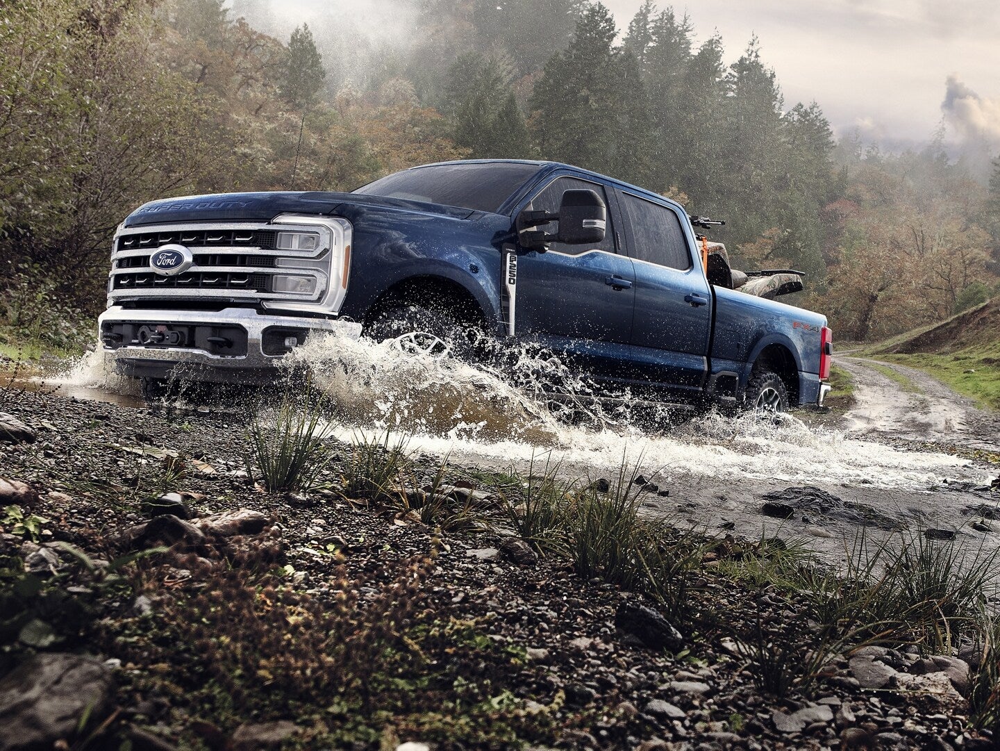 Used Ford Super Duty fording a water crossing off-road